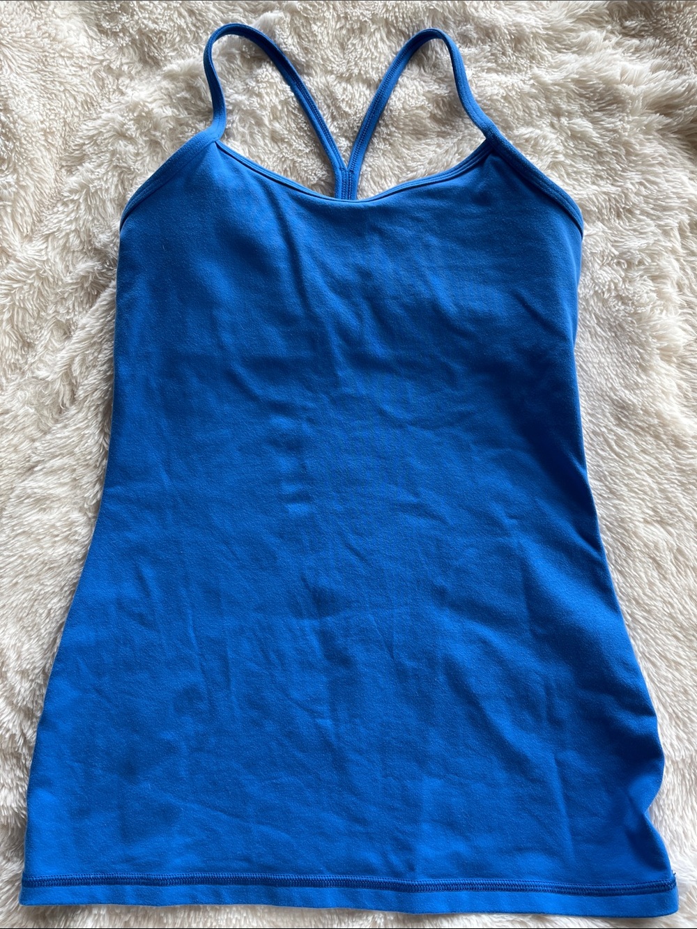 lululemon Blue RacerBack Tank. Built in bra size 6. Hip Length.